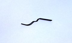 Pružina zajištění masky kapoty